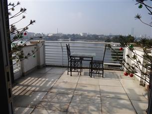 Big balcony, lake view studio with 01 bedroom for rent in Truc Bach, Ba Dinh